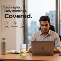Taking a LIVPURE liver detox gummy at a work desk — no water needed